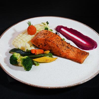 Grilled Salmon with mash potato and stem vegetables